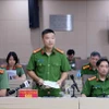 反腐败和经济犯罪调查警察局（C03）副局长武清松中校回答新闻媒体机构记者的提问。图自越通社