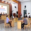 模拟法庭现场。图自越通社