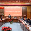 工作会谈场景。图自越通社