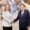越南国会主席陈青敏会见意越友好议员小组主席基亚拉·格里鲍多。图自越通社