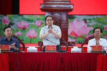 越南政府总理范明政发表讲话。图自越通社