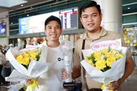 两名选手陈决战（左）和阮陈青字。图自劳动报