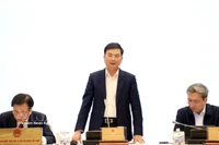 越南国家银行副行长范青河发言。图自越通社