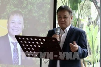 胡志明市建筑木材协会主席武光河。图自越通社