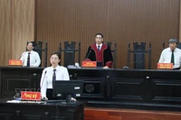 胡志明市人民法院庭审现场。 图自越通社