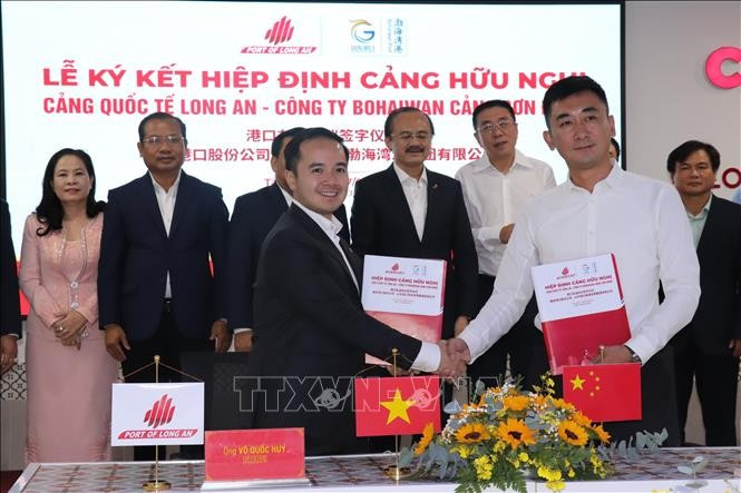 签署仪式现场。图自越通社