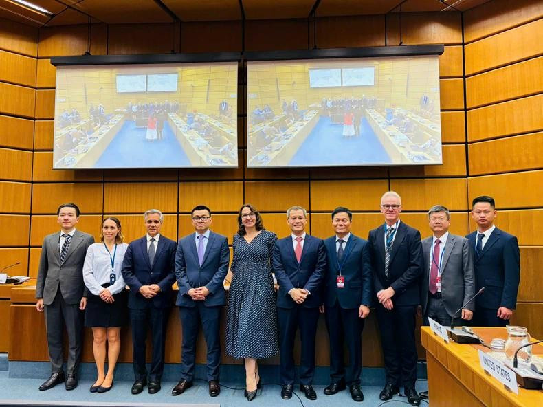 与会代表合影。图自越通社