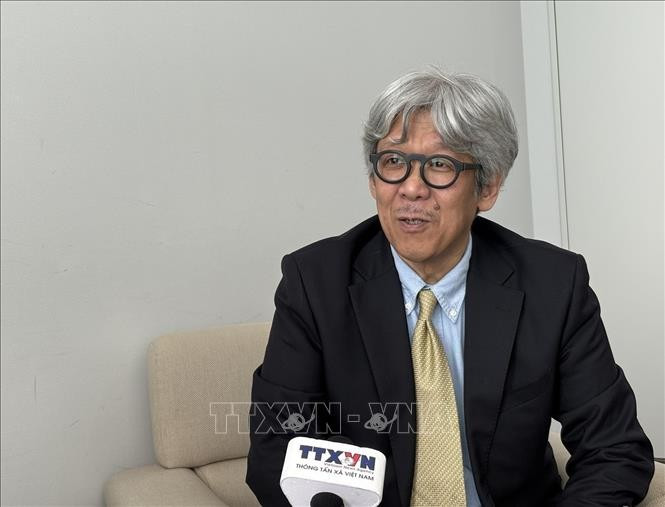 曾任共同社驻越南首席记者的三宅和久。图自越通社