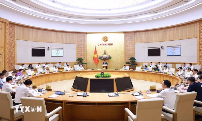 会议场景。图自越通社