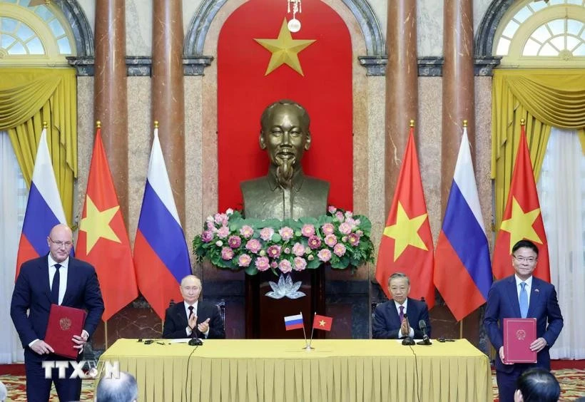 越南国家主席苏林与俄罗斯总统普京出席两国合作文件签署仪式。图自越通社
