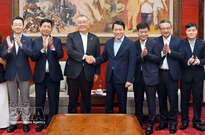 双方代表合影。图自越通社