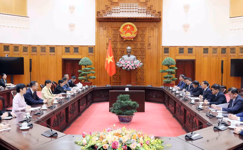 会见现场。图自越通社