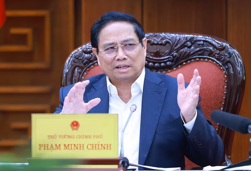 政府总理范明政在会议上发言。图自越通社