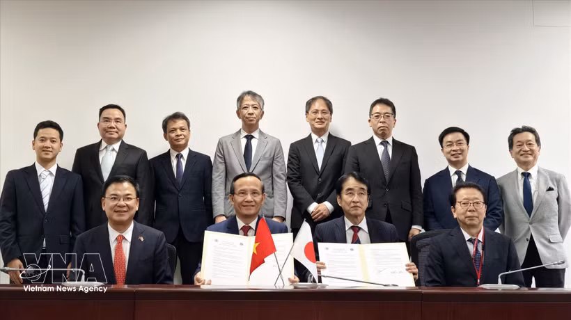 合作谅解备忘录签署仪式现场。图自越通社