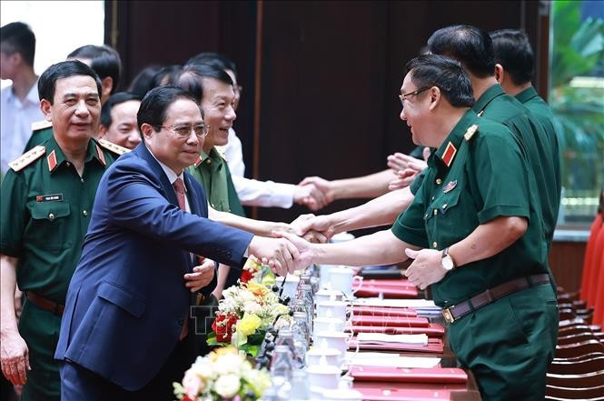 政府总理范明政出席全军军政会议。图自越通社