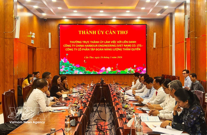 工作会谈现场。图自越通社