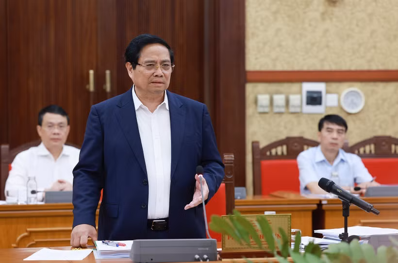 越南政府总理范明政主持中央政治局第二工作组与西宁和宣光两省省委常务委员会的工作会议。图自越通社