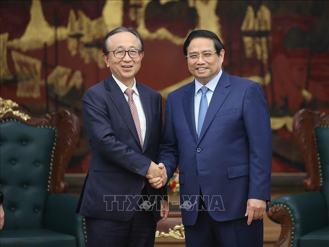 越南政府总理范明政会见日本三菱日联金融集团社长龟泽宏规。图自越通社