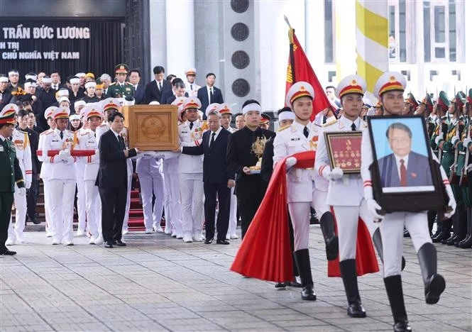 原越南国家主席陈德良追悼会隆重举行。图自越通社