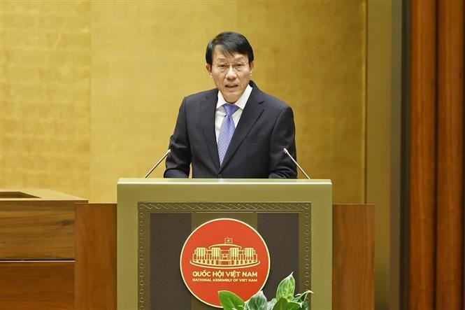 公安部部长梁三光作了报告。图自越通社