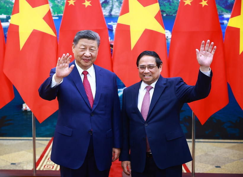 越南政府总理范明政会见中共中央总书记、国家主席习近平。图自越通社