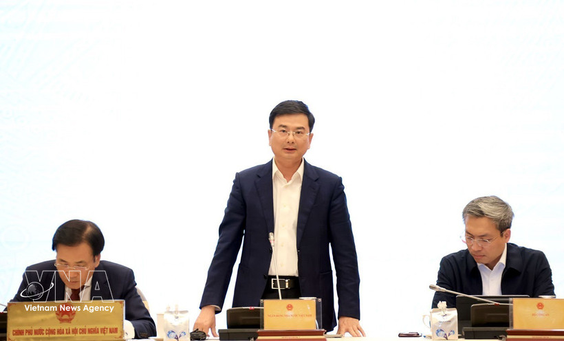 越南国家银行副行长范青河发言。图自越通社