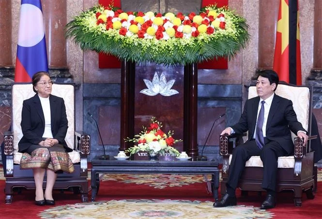 越南国家主席梁强会见老挝国家副主席巴妮·雅陶都。图自越通社
