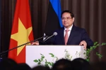越南政府总理范明政出席了越爱亚企业座谈会并发表讲话。图自越通社