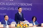 越南外交部副部长邓黄江发表讲话。图自越通社