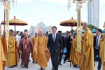 越南国家主席梁强出席2025年联合国卫塞节开幕式。图自越通社