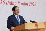 越南政府总理范明政发表讲话。图自越通社