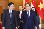 越南国会主席陈青敏和新加坡总理黄循财。图自越通社