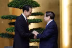 越南政府总理范明政会见中国驻越南大使何炜。图自越通社