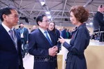 越南政府总理范明政和联合国教科文组织（UNESCO）总干事奥黛丽•阿祖莱。图自越通社