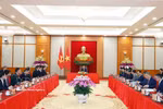 会见现场。图自越通社