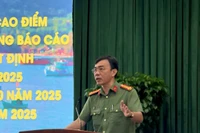 胡志明市公安局经济安全处副处长黎明宣上校在会上发表讲话。图自越通社