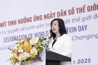越南卫生部长、国家人口与发展指导委员会常务副主任陶红兰发表讲话。图自越通社