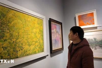 此展参观者。图自越通社