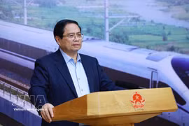 范明政总理发表讲话。图自越通社