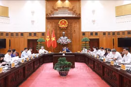 越南政府总理范明政主持召开落实中央委员会关于精简组织机构的第18号决议（18-NQ/TW）政府指导委员会会议。 图自越通社