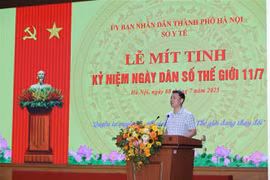 卫生部人口司司长黎青勇在会议上发言。图自越通社