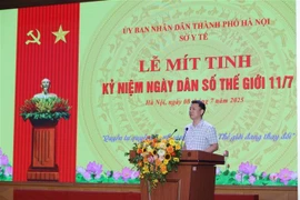 卫生部人口司司长黎青勇在会议上发言。图自越通社