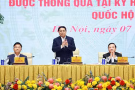 政府总理范明政主持召开会议。图自越通社