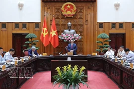 越南政府总理范明政在会议上发表讲话。图自越通社