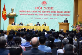 18日上午，越南政府总理黎明兴在河内主持召开政府常务委员会与企业会议。图自越通社