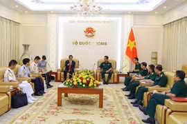 会见现场。图自越通社