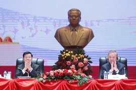 越共中央总书记苏林与老挝人民革命党中央总书记、国家主席通伦·西苏里主持召开越南共产党第十四次全国代表大会成果通报会。图自越通社