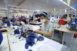 兴安省仙侣织造公司。图自越通社