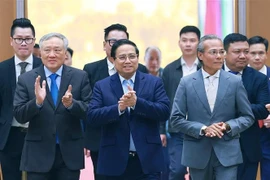 越南政府总理范明政主持召开政府常务委员会与中小企业会议。图自越通社