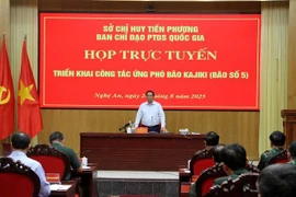 越共中央政治局委员、政府总理范明政主持会议。图自越通社